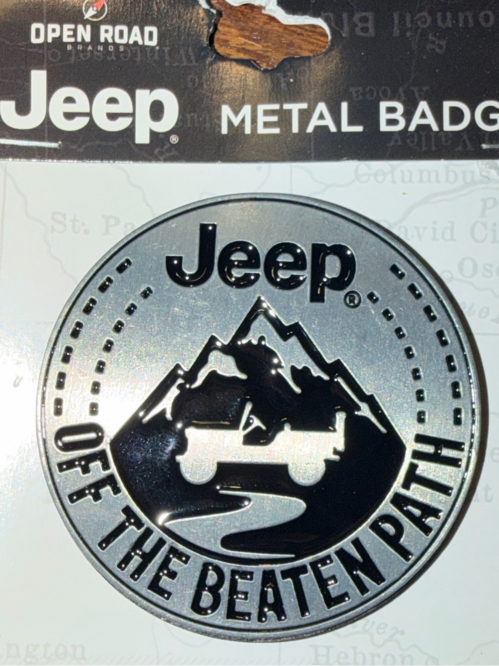 New in Package Jeep badge “Off the Beaten Path” Silver and Black